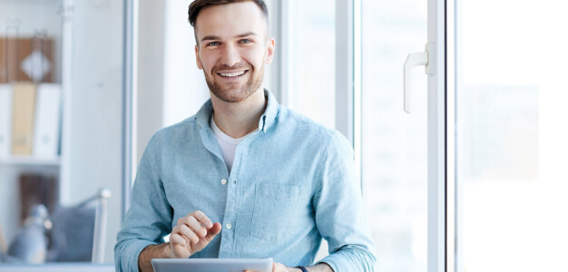 Man submitting their resume online to an employment agency